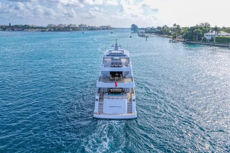 Slide: The Image of Luxury Hargrave E Series yacht cruising on serene blue waters, 2026 model. - 64