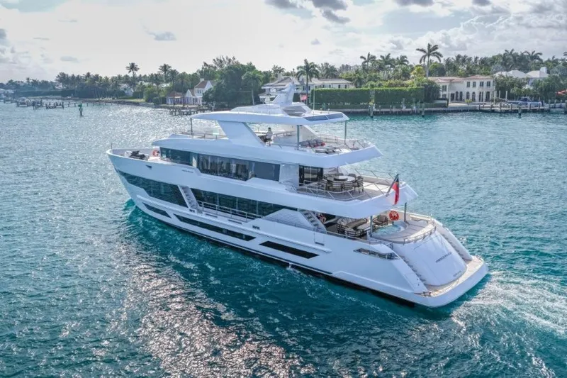 Slide: The Image of Luxurious 2026 Hargrave E Series yacht cruising on a scenic waterway. - 65