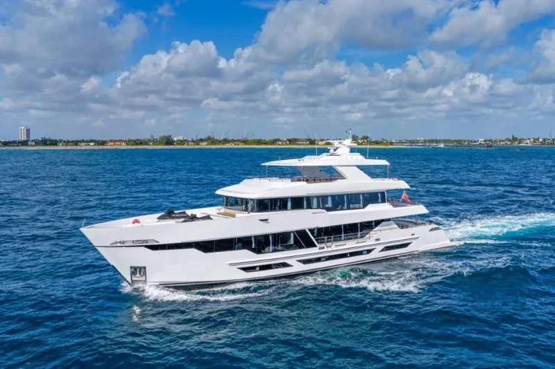 Slide: The Image of Luxurious 2026 Hargrave E Series yacht cruising on a sunny day in open waters. - 66