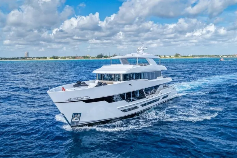 Slide: The Image of Luxurious 2026 Hargrave E Series yacht cruising on a clear blue ocean. - 67