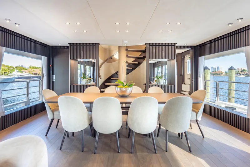 Slide: The Image of Luxurious dining area on 2025 Hargrave E Series yacht with elegant decor and waterfront views. - 7