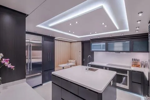 Slide: The Image of Luxurious modern kitchen in 2025 Hargrave E Series yacht, featuring sleek design and ambient lighting. - 8