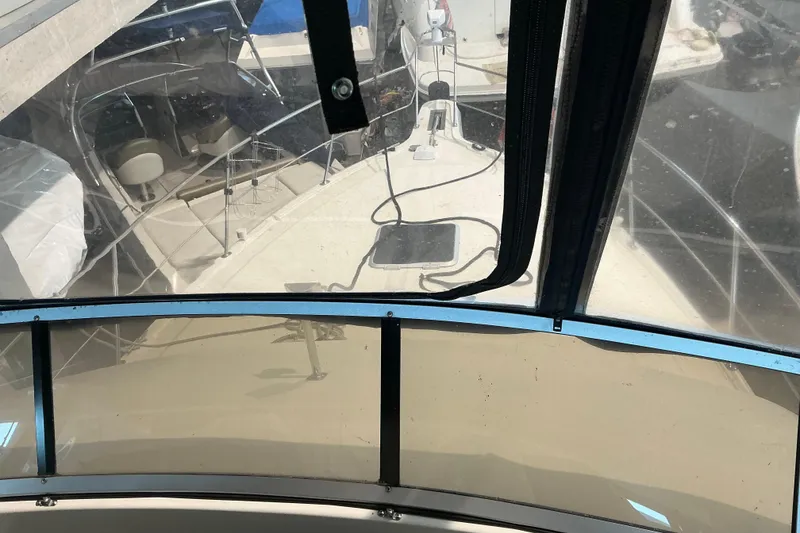 Slide: The Image of 1995 Carver 355 Aft Cabin Motor Yacht interior view through windshield. - 15
