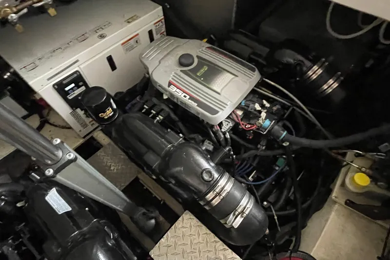 Slide: The Image of Engine compartment of a 2013 Regal 35 Sport Coupe with visible components and wiring. - 13