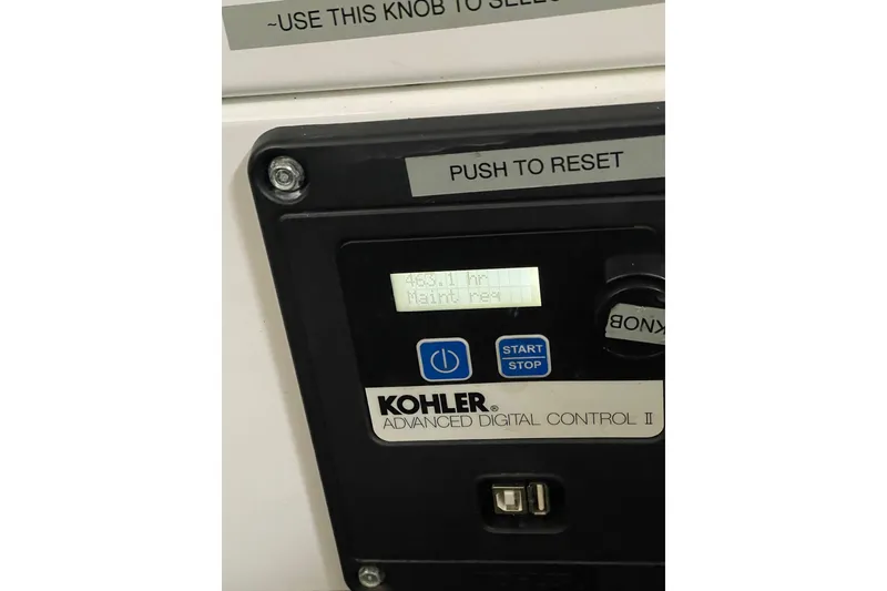 Slide: The Image of Kohler Advanced Digital Control II panel on 2013 Regal 35 Sport Coupe. - 15