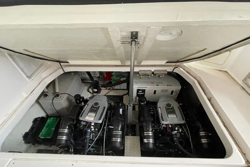 Slide: The Image of Engine compartment of a 2013 Regal 35 Sport Coupe with dual engines and equipment. - 17