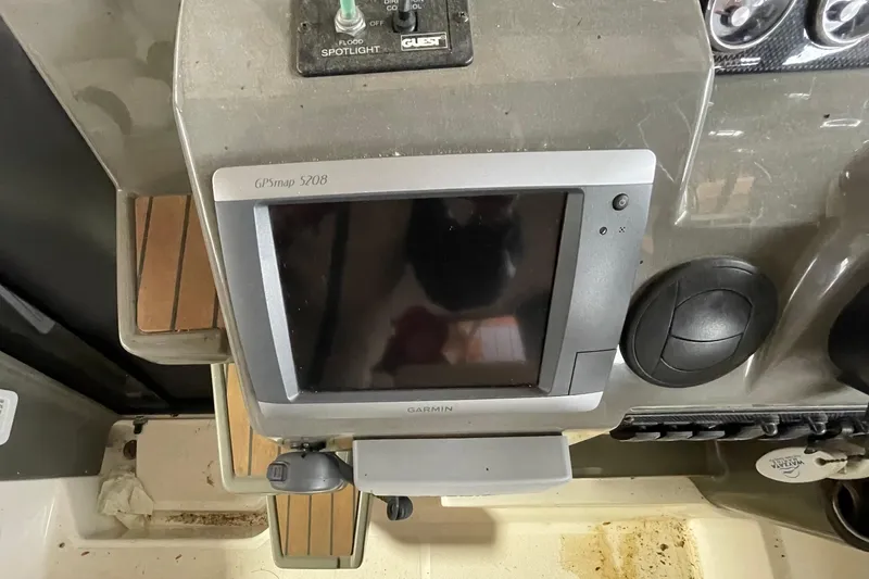 Slide: The Image of Garmin GPSmap 5208 on 2013 Regal 35 Sport Coupe dashboard. - 35