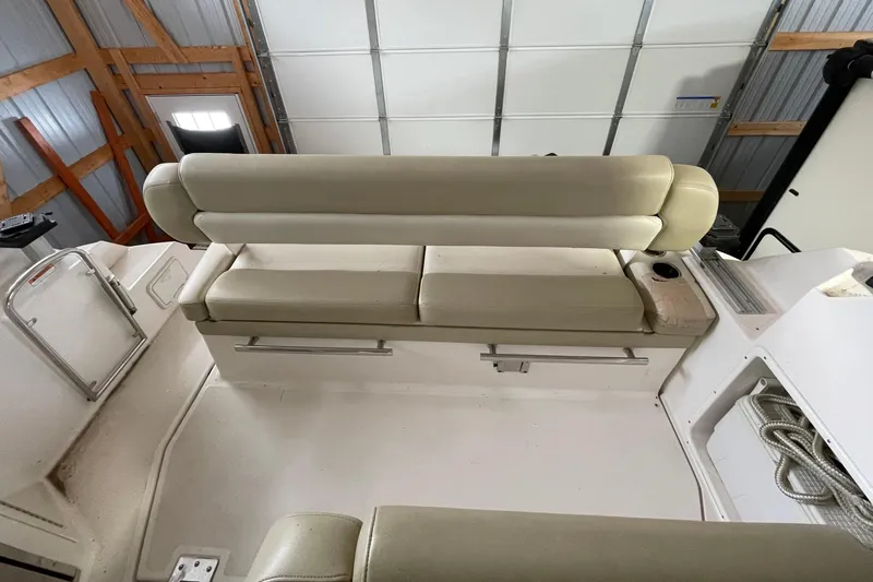 Slide: The Image of 2013 Regal 35 Sport Coupe interior seating in a garage setting. - 38