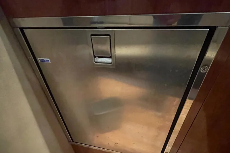 Slide: The Image of Stainless steel door on 2013 Regal 35 Sport Coupe yacht interior. - 51