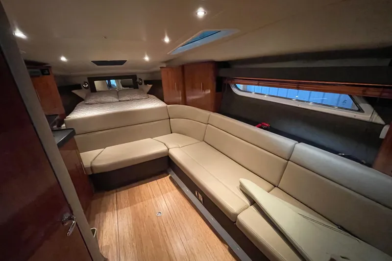 Slide: The Image of Luxurious interior of 2013 Regal 35 Sport Coupe with cozy seating and elegant design. - 55