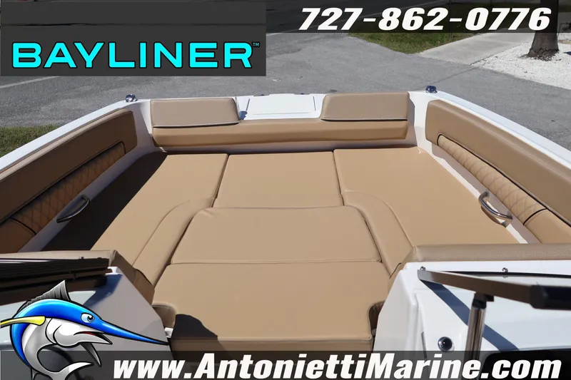Slide: The Image of 2026 Bayliner D22 boat interior with tan seating, showcased by Antonietti Marine. - 26