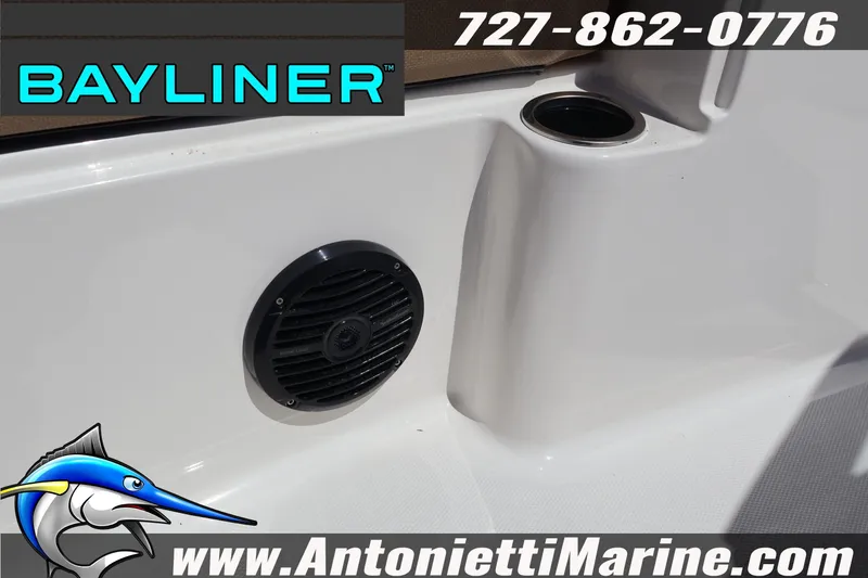 Slide: The Image of Bayliner D22 boat interior with speaker and cup holder, 2026 model. - 34