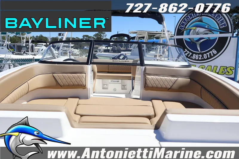 Slide: The Image of 2026 Bayliner D22 boat interior with tan seating at Antonietti Marine. - 7