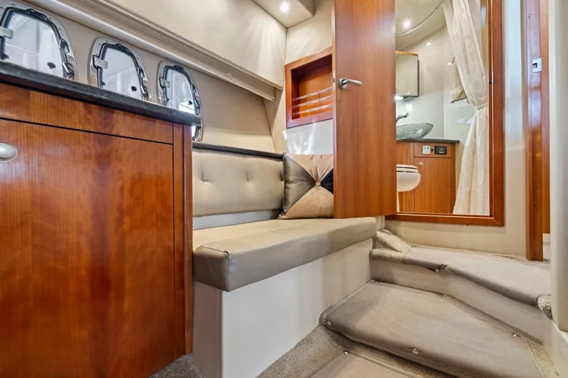 Slide: The Image of Luxurious interior of 2008 Cruisers Yachts 447 Sport Sedan with elegant wood finishes. - 25