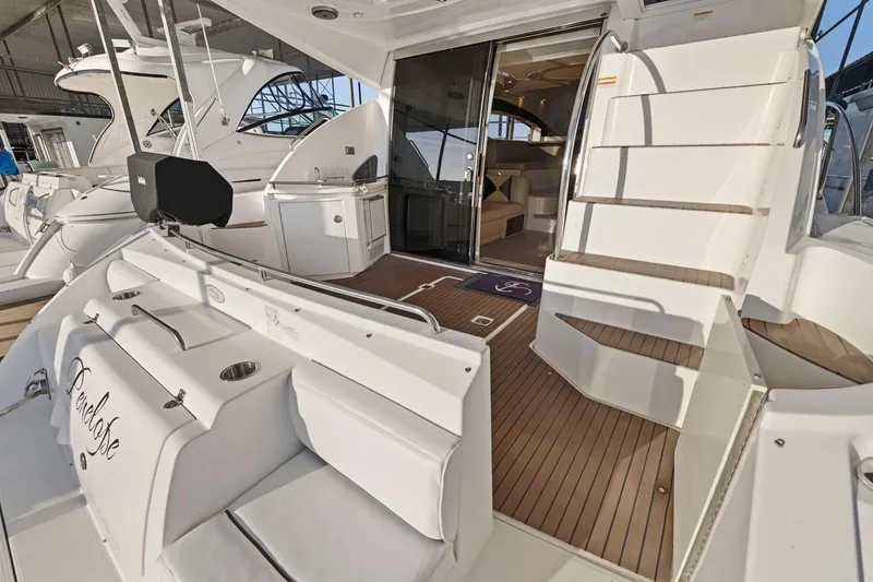 Slide: The Image of 2008 Cruisers Yachts 447 Sport Sedan with elegant deck and luxurious interior view. - 4