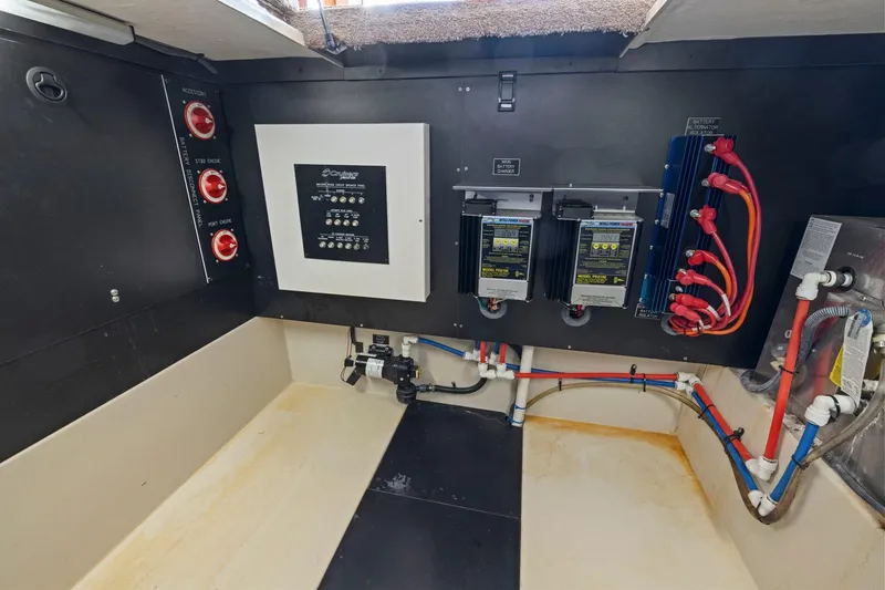 Slide: The Image of Electrical panel and wiring in a 2008 Cruisers Yachts 447 Sport Sedan. - 43
