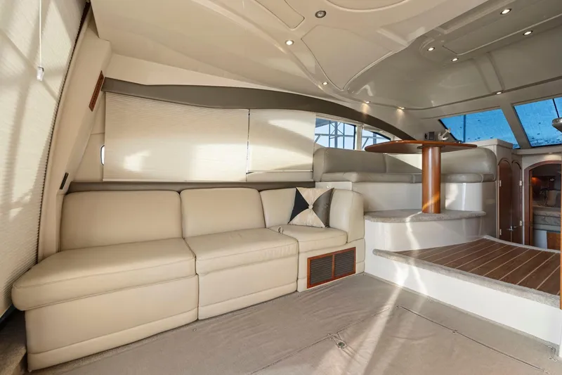 Slide: The Image of Luxurious interior of 2008 Cruisers Yachts 447 Sport Sedan with beige seating and elegant design. - 8
