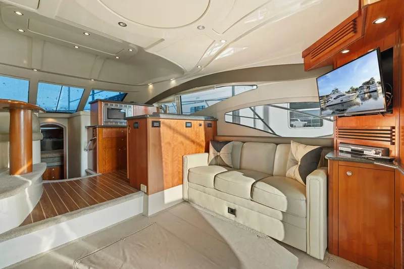 Slide: The Image of Luxurious interior of 2008 Cruisers Yachts 447 Sport Sedan with modern amenities and elegant design. - 9