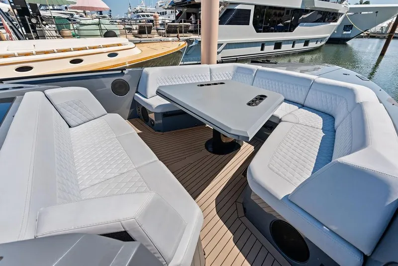 Slide: The Image of Luxurious seating area on 2024 Vanquish Yachts VQ55 with elegant design and modern amenities. - 16