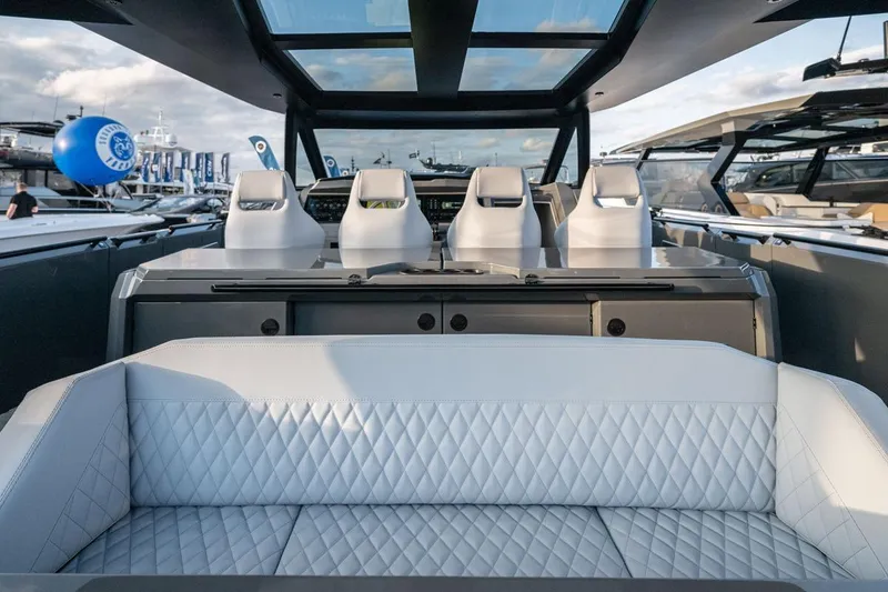 Slide: The Image of Luxurious interior of 2024 Vanquish Yachts VQ 55 with sleek seating and modern design. - 3