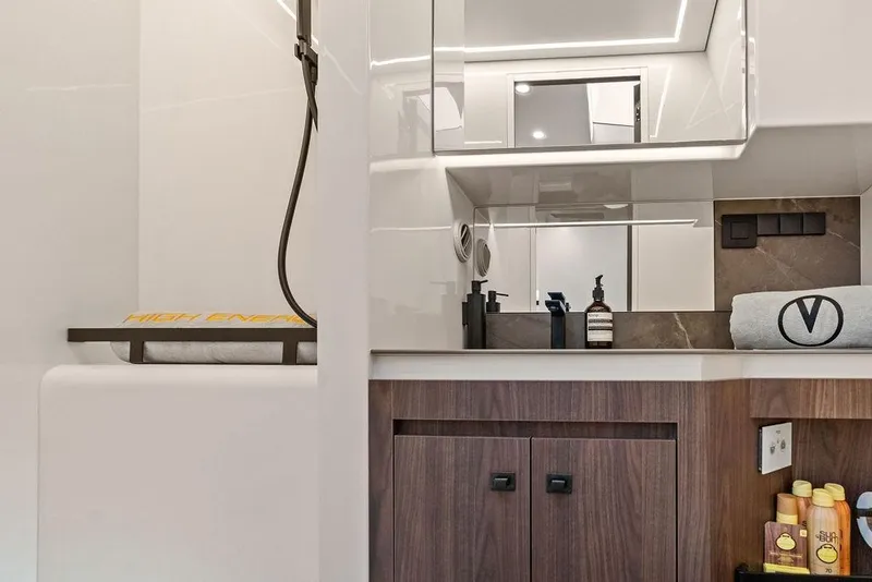 Slide: The Image of Luxurious bathroom interior of 2024 Vanquish Yachts VQ55, featuring modern fixtures and elegant design. - 41