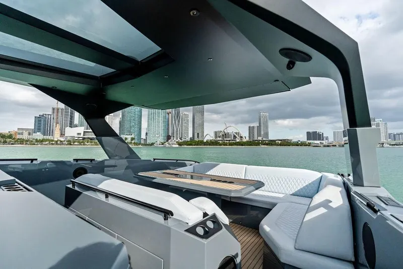 Slide: The Image of Luxurious 2024 Vanquish Yachts VQ55 interior with city skyline view. - 44