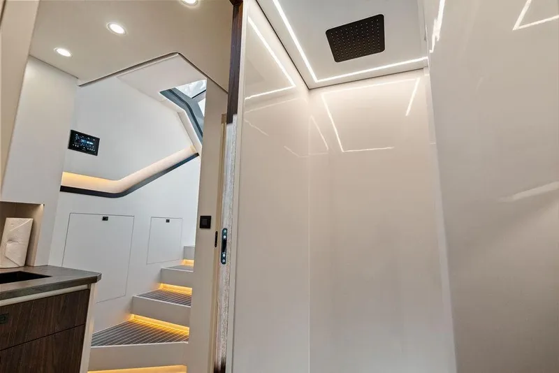 Slide: The Image of Luxurious interior of 2024 Vanquish Yachts VQ55, featuring modern design and ambient lighting. - 45