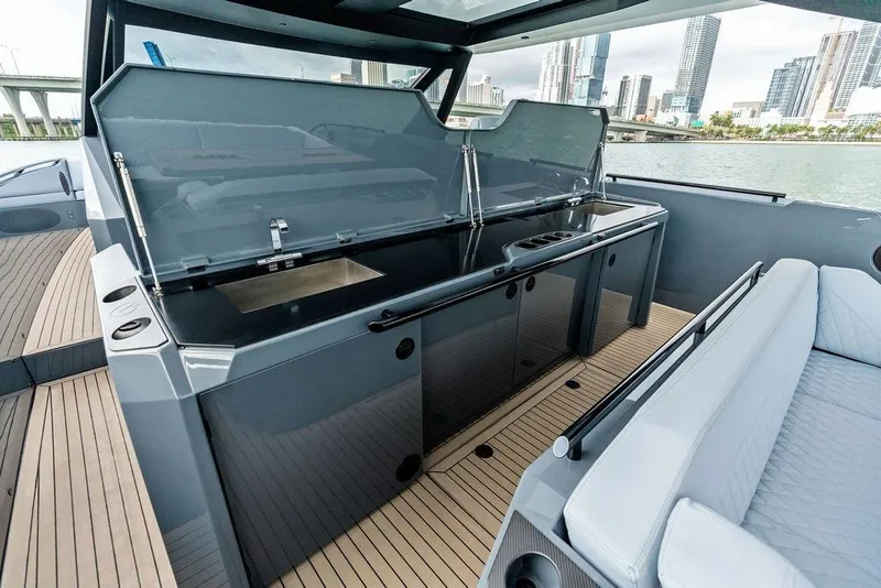 Slide: The Image of 2024 Vanquish Yachts VQ55 luxury yacht interior with sleek kitchen and modern design. - 52