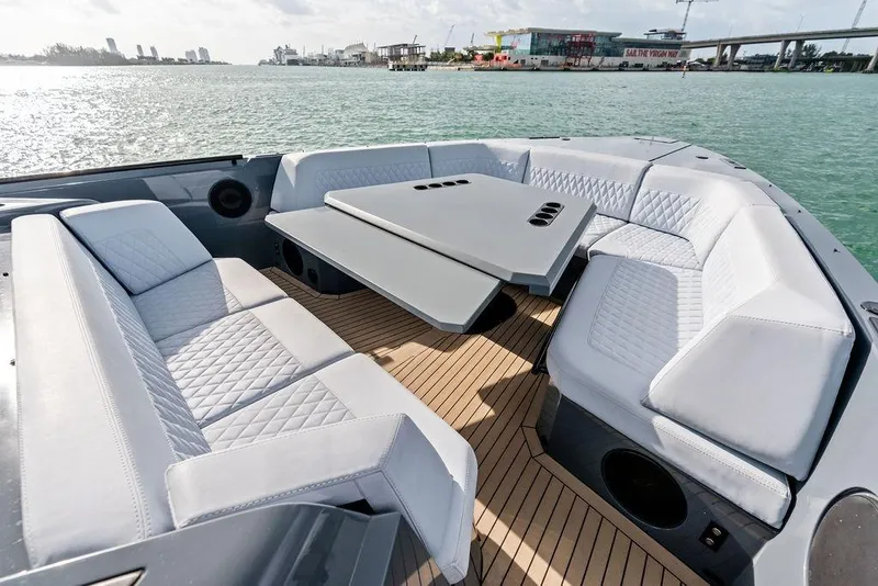Slide: The Image of Luxurious seating area on 2024 Vanquish Yachts VQ55, featuring elegant design and waterfront view. - 59