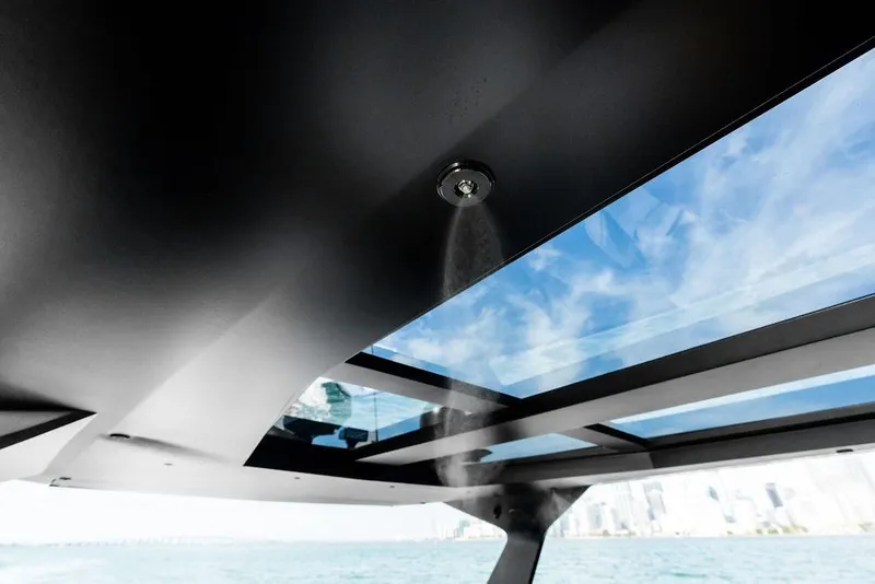 Slide: The Image of 2024 Vanquish Yachts VQ55 yacht interior with skylight and water misting system. - 62