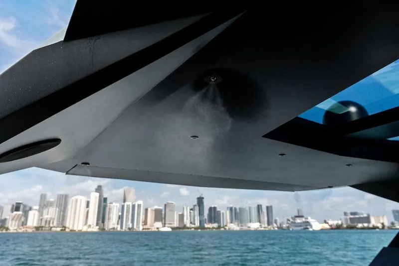 Slide: The Image of 2024 Vanquish Yachts VQ55 with city skyline in the background. - 64