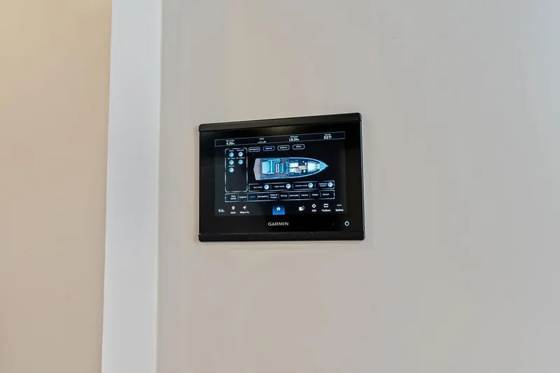 Slide: The Image of Garmin control panel on 2024 Vanquish Yachts VQ55, displaying yacht layout and settings. - 69