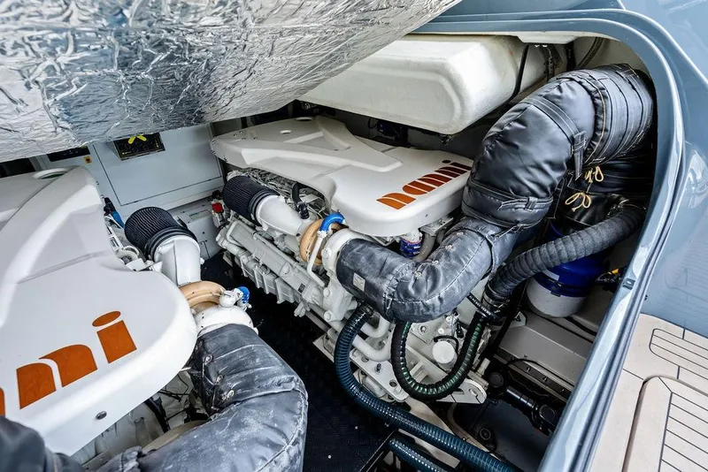 Slide: The Image of Engine compartment of 2024 Vanquish Yachts VQ55, showcasing advanced marine engineering. - 73