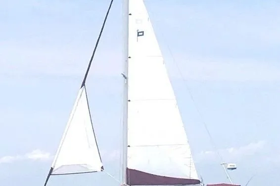 Slide: The Image of 1980 Pearson 365 Sloop sailing near city skyline on a sunny day. - 17