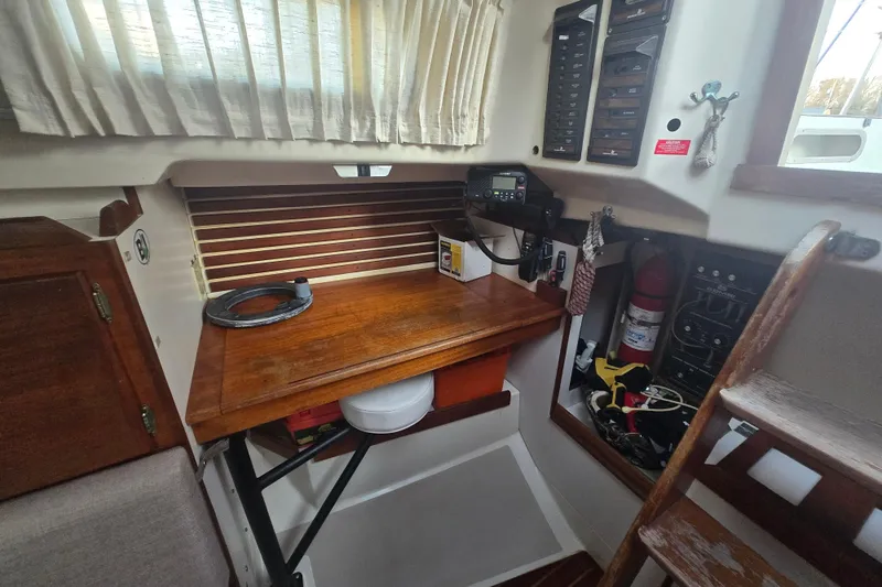 Slide: The Image of Interior of 1980 Pearson 365 Sloop with navigation station and equipment. - 40
