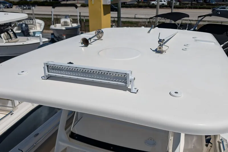 Slide: The Image of 2023 Key West 263 FS boat roof with mounted light bar and antennas. - 21