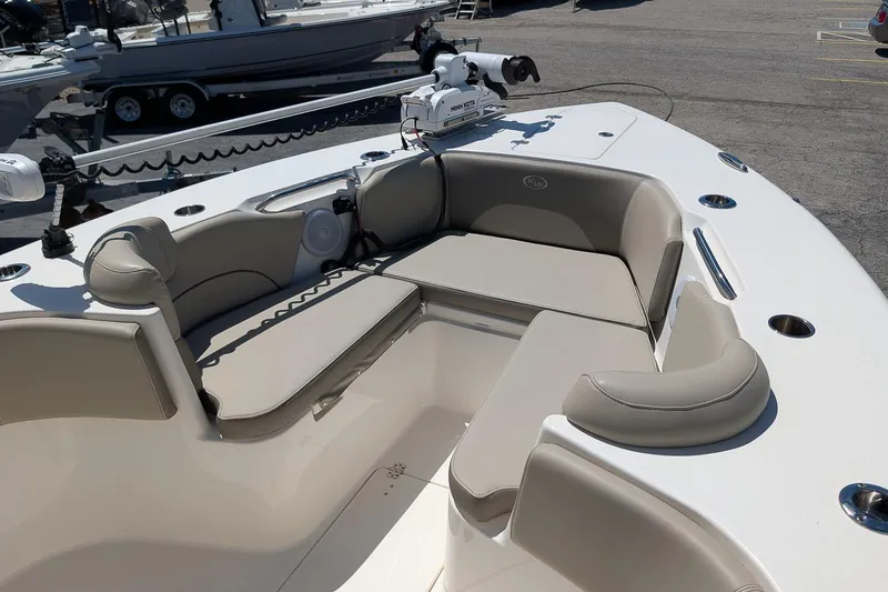 Slide: The Image of 2023 Key West 263 FS boat interior with cushioned seating and modern design. - 22