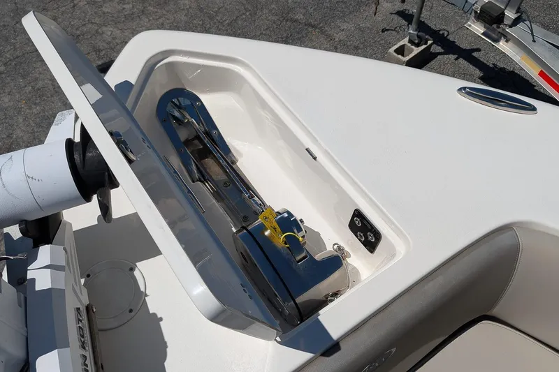 Slide: The Image of 2023 Key West 263 FS boat anchor compartment with mounted equipment. - 24