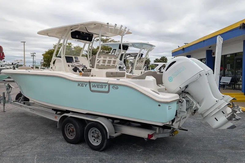Slide: The Image of 2023 Key West 263 FS boat on trailer with Yamaha outboard motor. - 3
