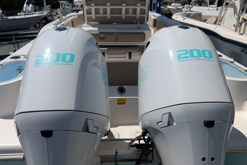 Slide: The Image of 2023 Key West 263 FS boat with twin Yamaha 200 four-stroke engines. - 4