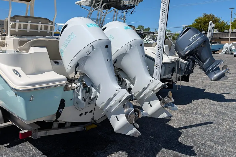 Slide: The Image of 2023 Key West 263 FS boat with dual Yamaha outboard motors. - 7