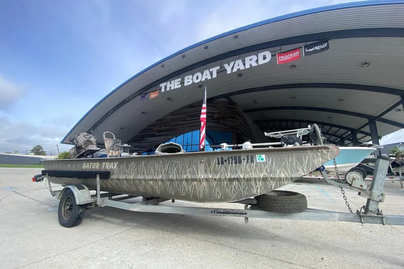 Slide: The Image of 2009 Gator Trax MUD BUDDY boat on trailer at The Boat Yard. - 2