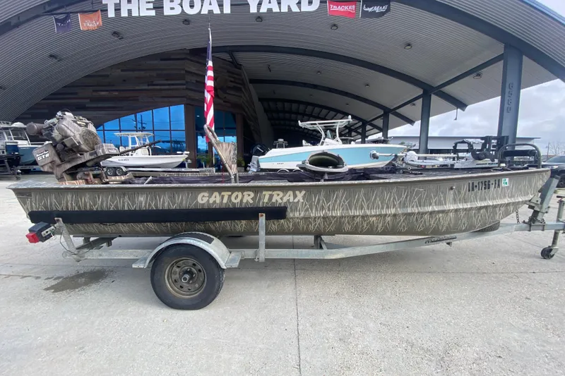 Slide: The Image of 2009 Gator Trax MUD BUDDY boat on trailer at The Boat Yard. - 3