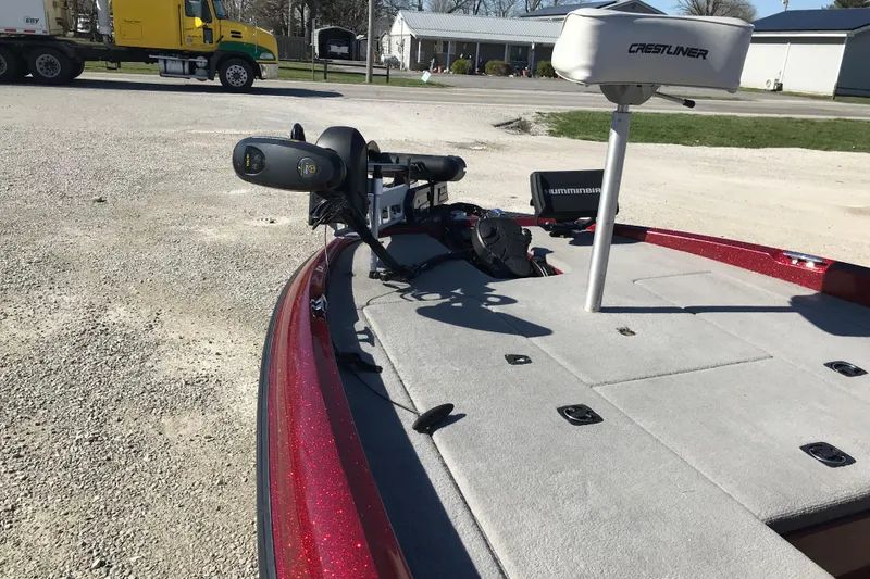 Slide: The Image of 2008 Triton 18 Explorer boat with Crestliner seat and Humminbird equipment on deck. - 16