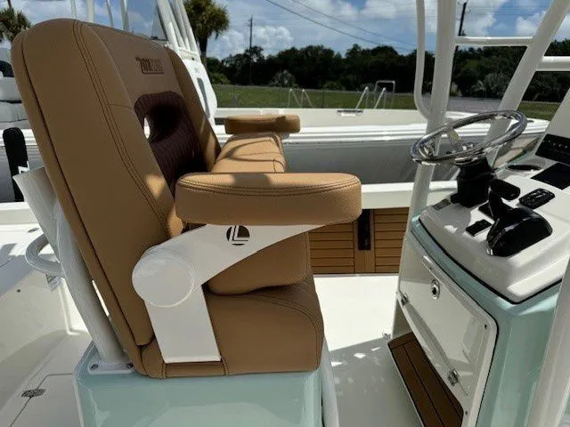Slide: The Image of Interior of 2025 Pathfinder 2600 HPS with steering wheel and leather seats. - 21