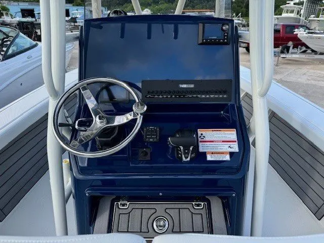 Slide: The Image of Pathfinder 2400 Open 2025 helm with sleek design and controls. - 30