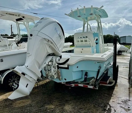 Slide: The Image of 2025 Pathfinder 2600 TRS boat with outboard motor on trailer. - 25