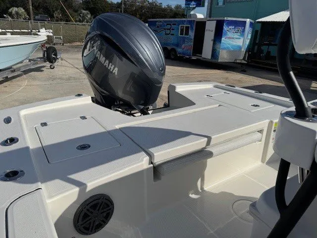 Slide: The Image of Pathfinder 2200 TRS 2025 with Yamaha engine on boat deck. - 22