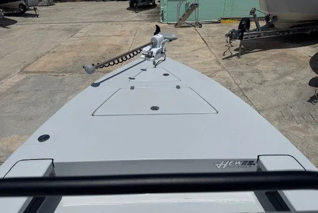 Slide: The Image of Hewes Redfisher 18 boat, front deck view, year 2026. - 19