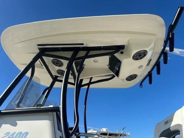 Slide: The Image of Pathfinder 2400 Open 2026 boat roof with speakers, blue sky. - 27
